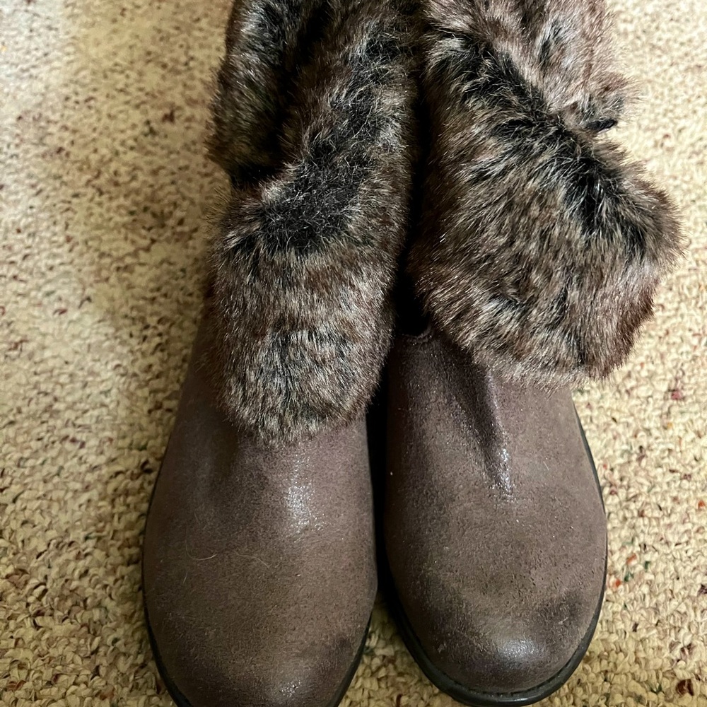 Candies distressed brown leather boots.